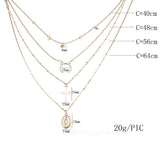 European and American fashion personality cross small round eclipse moon round Buddha statue four-layer necklace jewelry