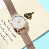 Carved Pattern Dial Women's Watch