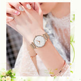 Carved Pattern Dial Women's Watch