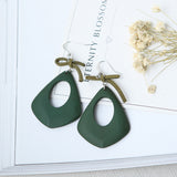 Fashion Europe and America exaggerated geometric bow hollow hollow earrings