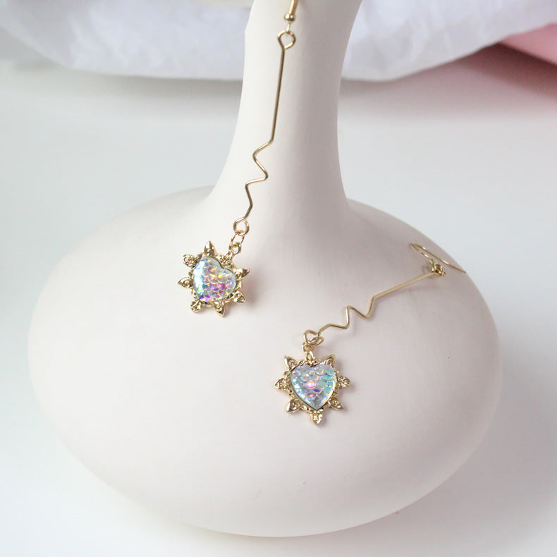 Fashion long wave irregular peach heart earrings