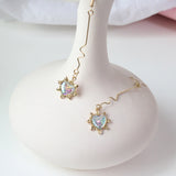 Fashion long wave irregular peach heart earrings