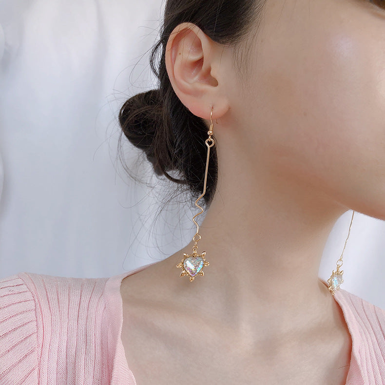 Fashion long wave irregular peach heart earrings