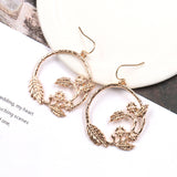 Fashion creative circle branches leaf pattern earrings