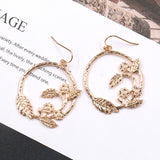 Fashion creative circle branches leaf pattern earrings