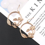 Fashion creative circle branches leaf pattern earrings