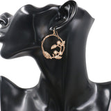 Fashion creative circle branches leaf pattern earrings