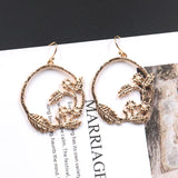 Fashion creative circle branches leaf pattern earrings